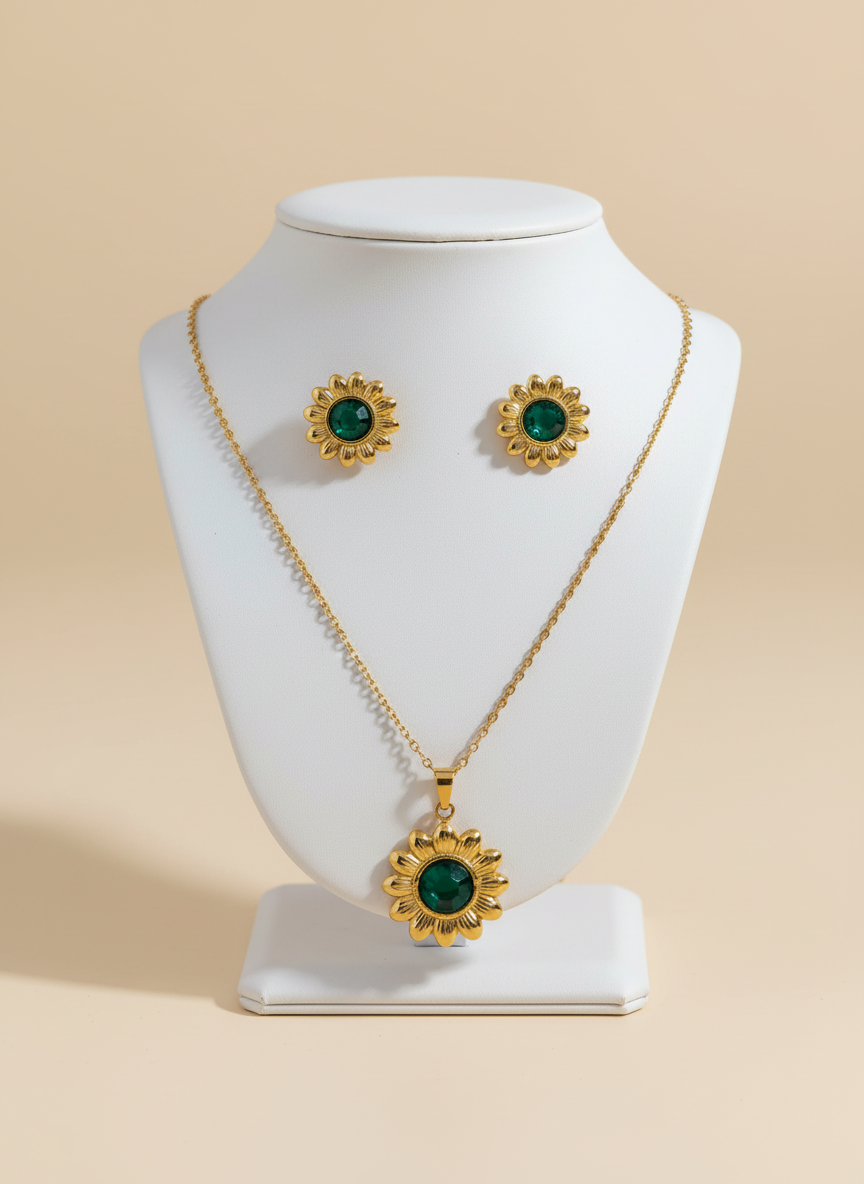 gold-toned sunflower pendant necklace and earrings set with green stone