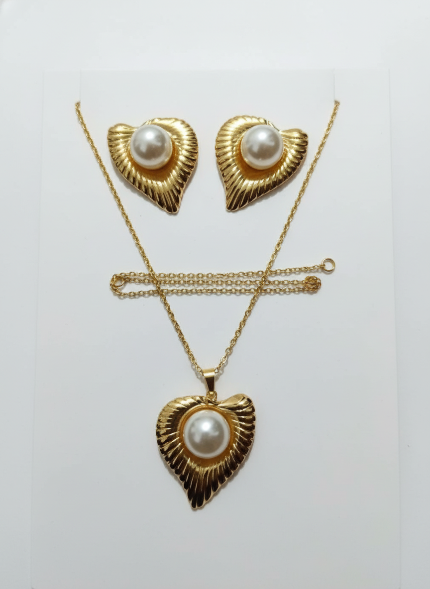 gold-toned heart-shaped pearl pendant necklace set with matching earrings